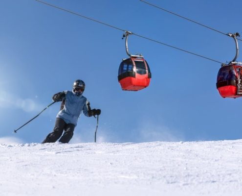 Skier ripping it up and some nice corduroy in Breckenridge