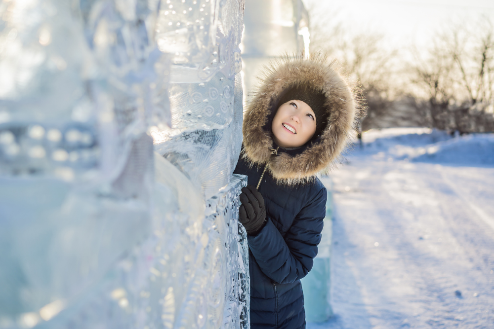 woman looking at ice sculpture
